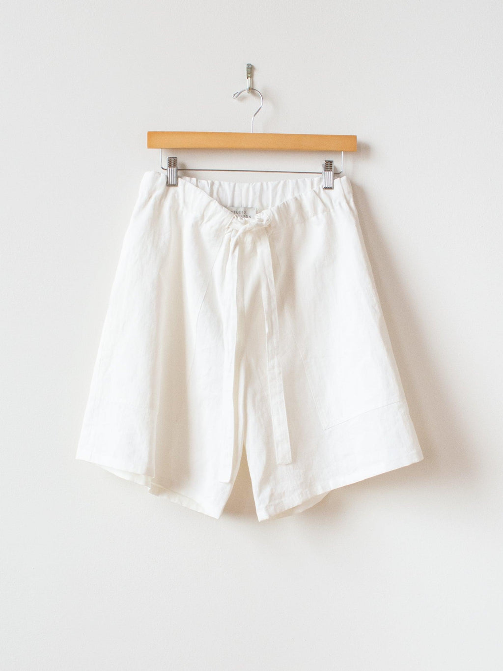 Namu Shop - Studio Nicholson Leda Coated Linen Shorts - Milk