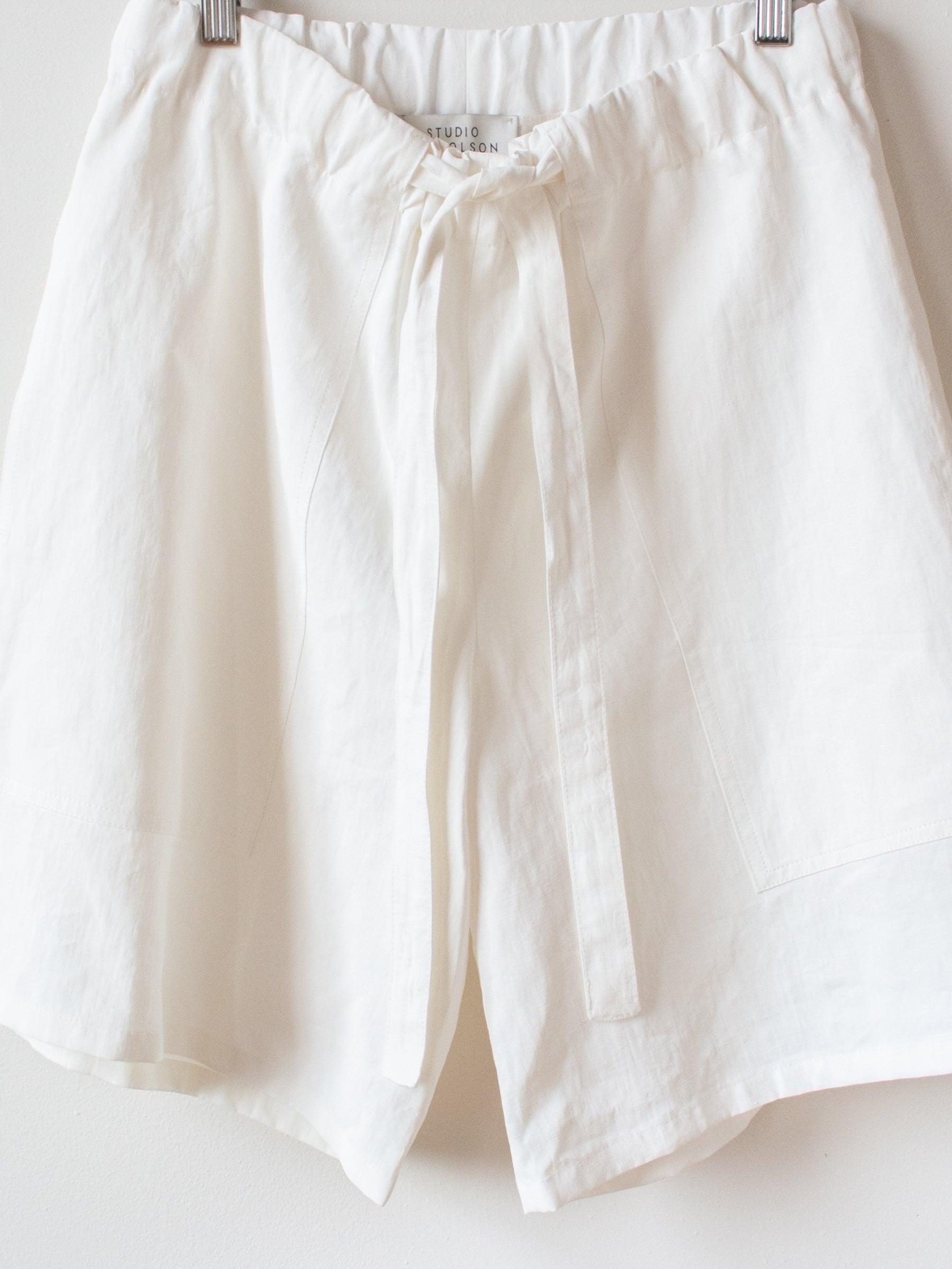 Namu Shop - Studio Nicholson Leda Coated Linen Shorts - Milk